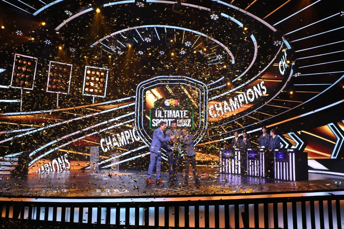 Champions celebration with confetti on stage